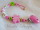 Schnullerkette mit Wunschname Schmetterling magenta